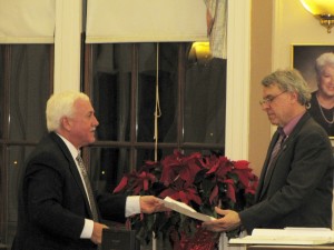 Outgoing Ward 1 Alderman William Roche (L)submits his letter of resignation to City Clerk John Long