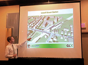 Bryant Associates’ Mark Suscovich presented details to the curious crowd that gathered at the Holiday Inn last week, hoping for a clear vision of what to expect concerning the Community Path and the Green Line Extension. ~Photo by Blake Maddux