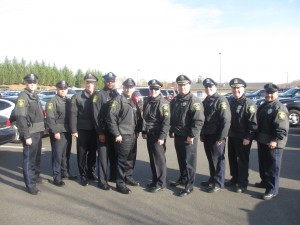 The convoy of over two hundred police cruisers met at the Burlington Mall and throughout the route from Massachusetts to Virginia. Left to right: Jason Costa, Lt. Dan Cotter, Randy Isaacs, Alan Monaco, Sgt. Scott Whalen, Deputy Chief Mike Cabral, Robert Pasqualino, Captain Paul Trant and Eric Ubeda. 