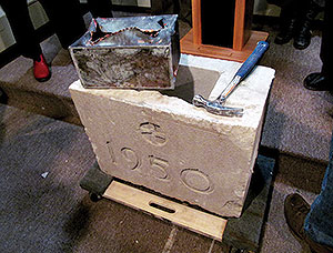 This metal box was inserted into the cornerstone of the former Saint Polycarp School, where it remained for over 60 years until the building was recently demolished. The 1950 date marks the year the cornerstone was laid. ~Photo by Elizabeth Sheeran