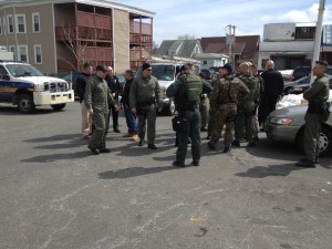 Swat team assembled at old Star Market parking lot on Broadway. 