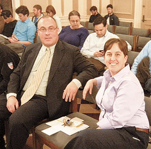 Courtney O’Keefe sits with outbound Ward 5 Alderman Sean O’Donavan, who has nominated O’Keefe to serve out the remainder of his term. ~Photo by Donald Norton