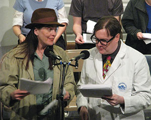 Liz Adams and Rob Noyes in the Post Meridian Radio Players' production of “Red Shift: Interplanetary Do Gooder,” performing at the Responsible Grace Church of Somerville. ~Photo by Jay Sekora