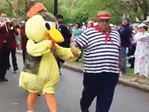 Somerville's own Koni as a duckling and her husband Frank as "Captain Guido" lead the “Make Way for Ducklings Parade” Sunday. – Photo by William Tauro