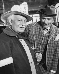  Fiedler dressed for the part of a fireman for a show skit. Skelton is dressed as Clem Kadiddlehopper.   Fiedler conducted his orchestra and played the role of a fireman in the same April 1969 Red Skelton Show visit.