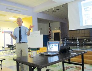 Director of Parks and Open Space of Mayor’s Office of Strategic Planning & Community Development, Arn Franzen explained plans for the new park, Symphony.~Photo by Douglas Yu