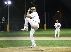 Sean Sullivan’s pitching helped take the Somerville Alibrandis Baseball Club to victory in Monday night’s match-up against the Brighton Braves in game 1 of the semi-final series. ~Photo by Harry Kane.