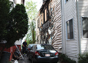 Moderate structural damage and light personal injuries were sustained by the blaze which broke out on Banks St. Tuesday morning. ~Photo by Harry Kane