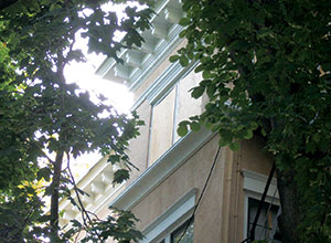 The top floor of the four-story residence at 34 Highland Ave. sustained significant damage from a fire that broke out on Tuesday afternoon. ~Photo by Bobbie Toner