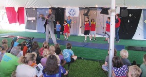 Kids learn a variety of performing skills including Acro-balance, Devil sticks, Hat-manipulation, and Hula Hoops when they participate in the annual OPENAIR Circus. ~Photo by Douglas Yu